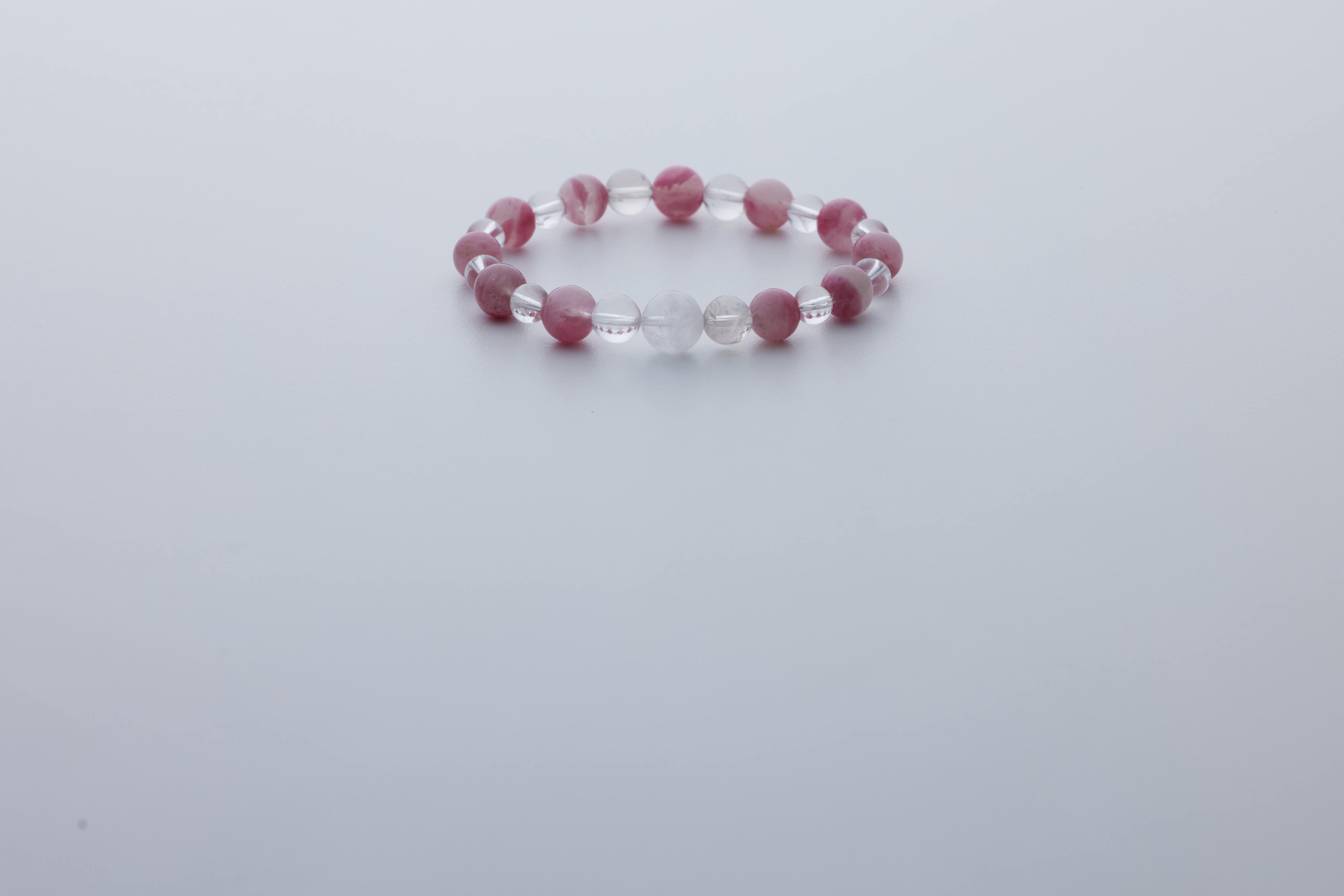 櫻花雨薔薇水晶手鏈｜白幽靈聚寶盆、透體白水晶｜聚財喜緣．浪漫守護