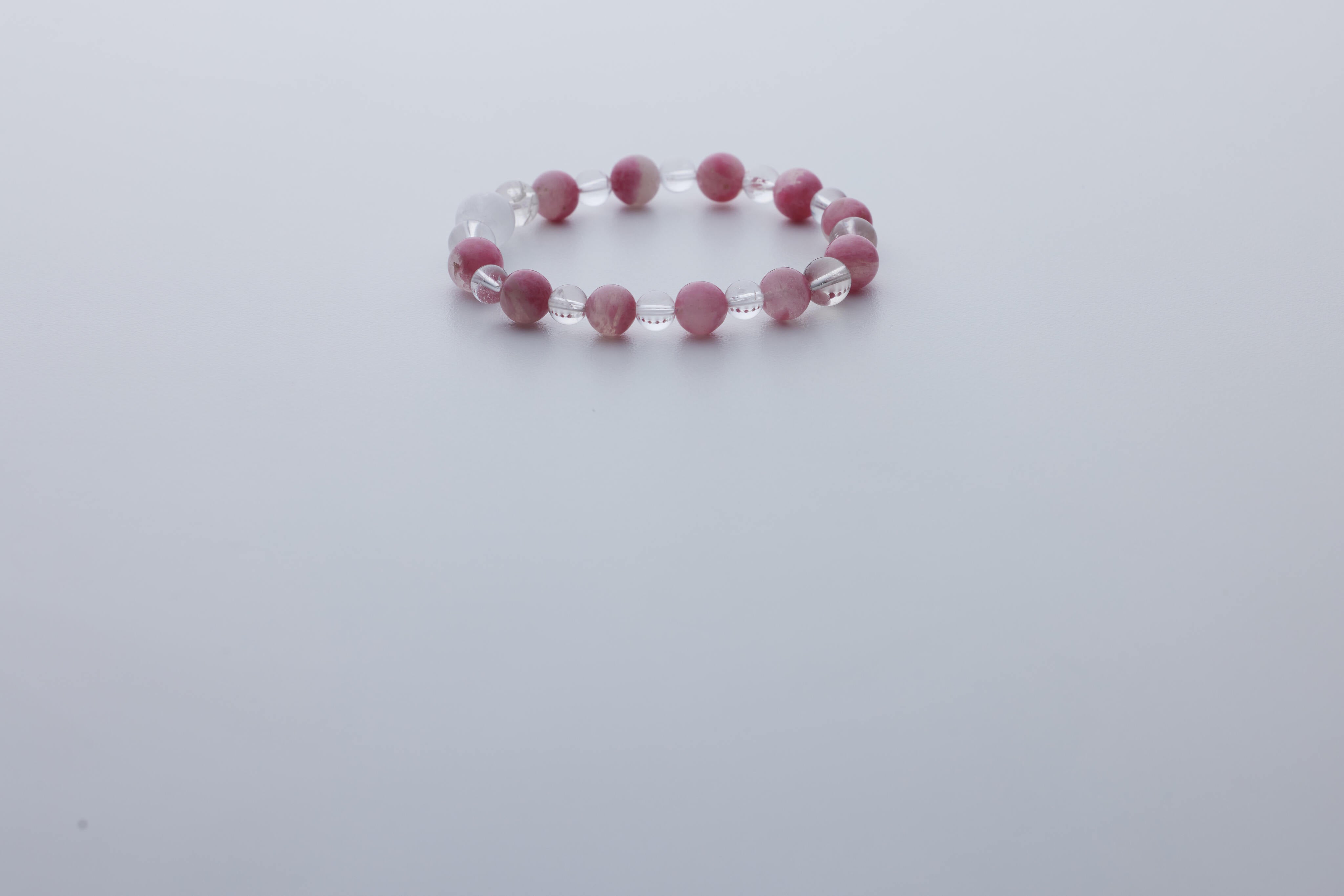 櫻花雨薔薇水晶手鏈｜白幽靈聚寶盆、透體白水晶｜聚財喜緣．浪漫守護